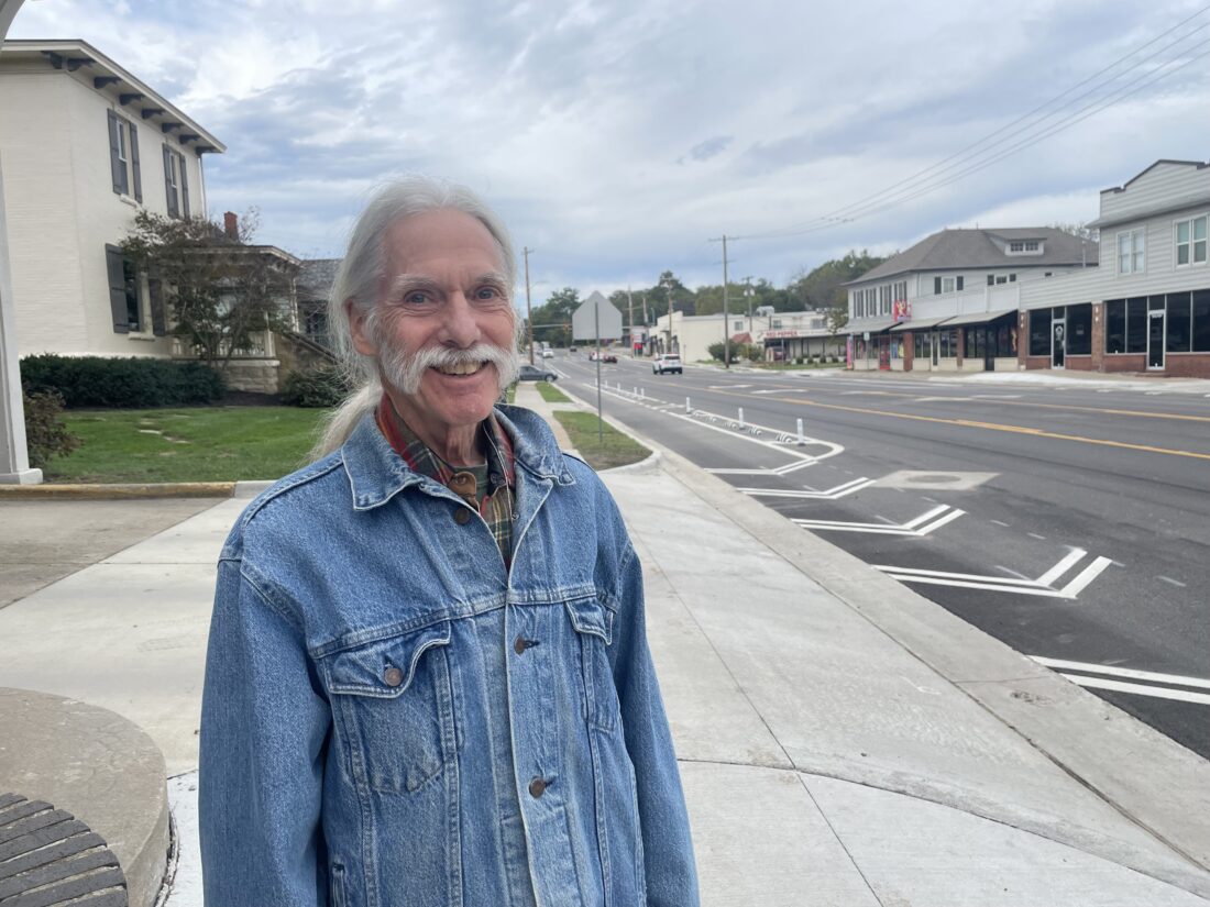 Lawrence’s first bike lanes with physical barriers are installed on Ninth Street